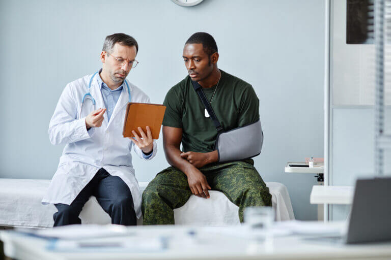 soldier in the hospital talking to a doctor